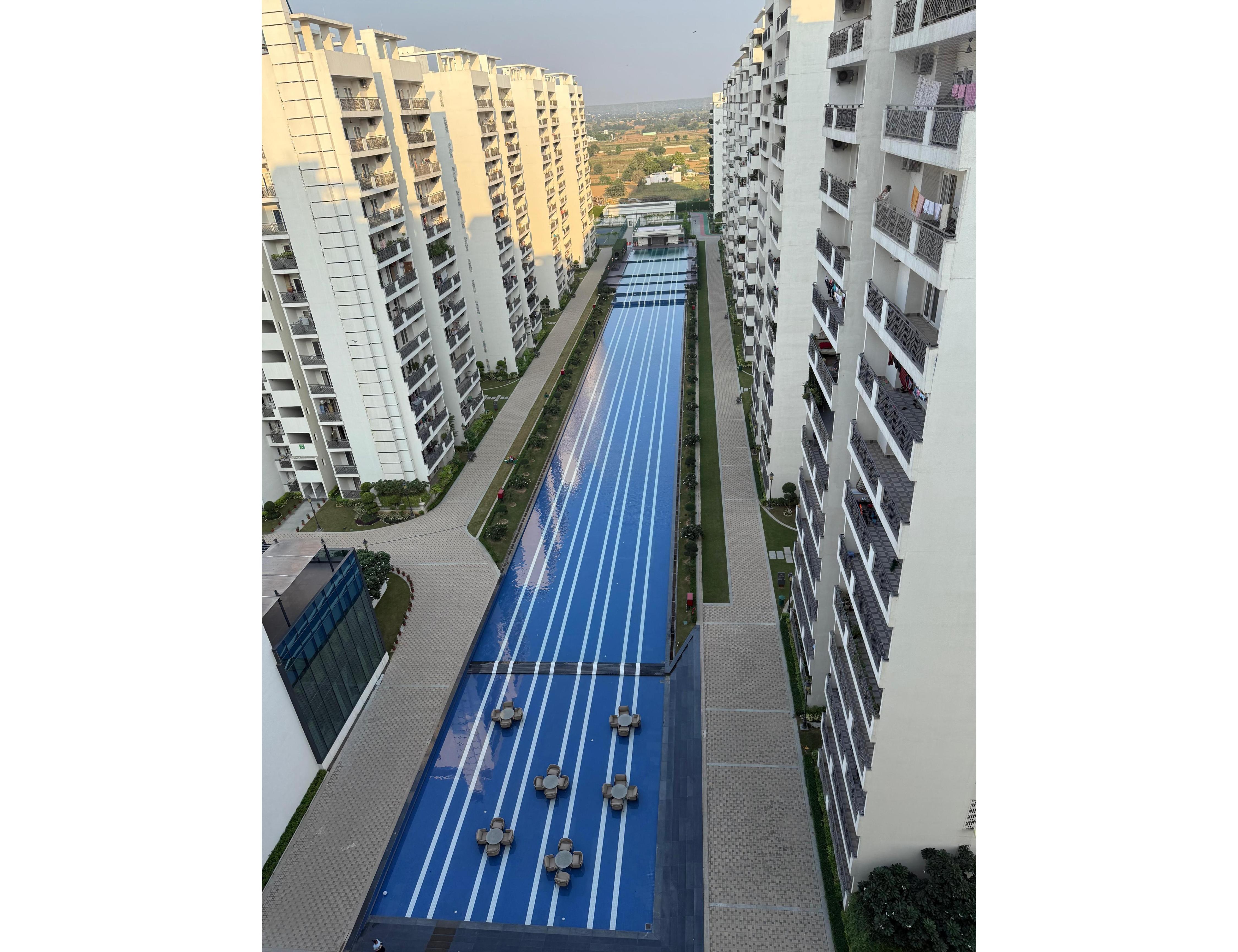 Central Park Flower Valley-Pool View Retreat 2BHK Apartment - Tap to explore photos