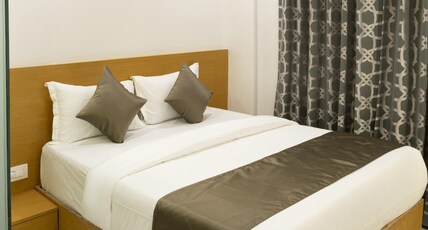 Hotel Stayzi inn Room Type - Deluxe Room with Air Conditioning