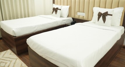 QuickIn Stayz by Rupali Homes Room Type - Luxury Twin Room with Kitchenette and Balcony