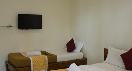 Rajvilas Homestay Room Type - Standard Triple Room With Balcony 
