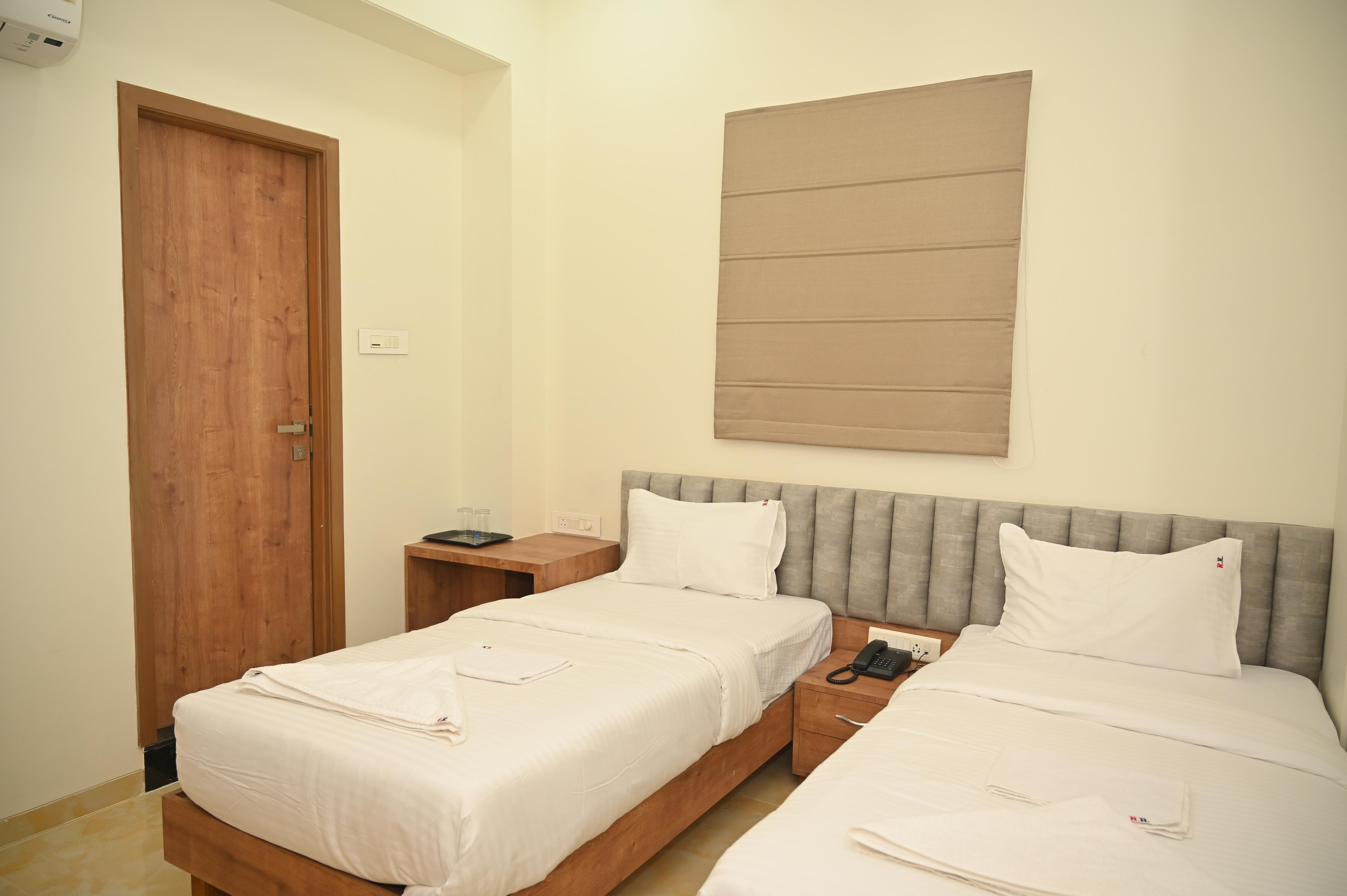 RAJVEER RESIDENCY Room Type - Twin Deluxe