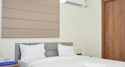 RAJVEER RESIDENCY Room Type - Deluxe King Bed