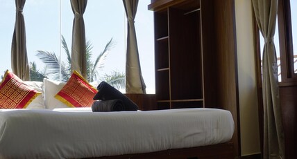 AT CKM Homestay. Room Type - Classic Suit Room With Balcony.