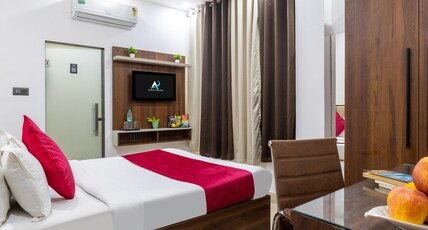 Aura Grand Residency Room Type - Deluxe Room With High Speed Internet ( Couple Friendly )