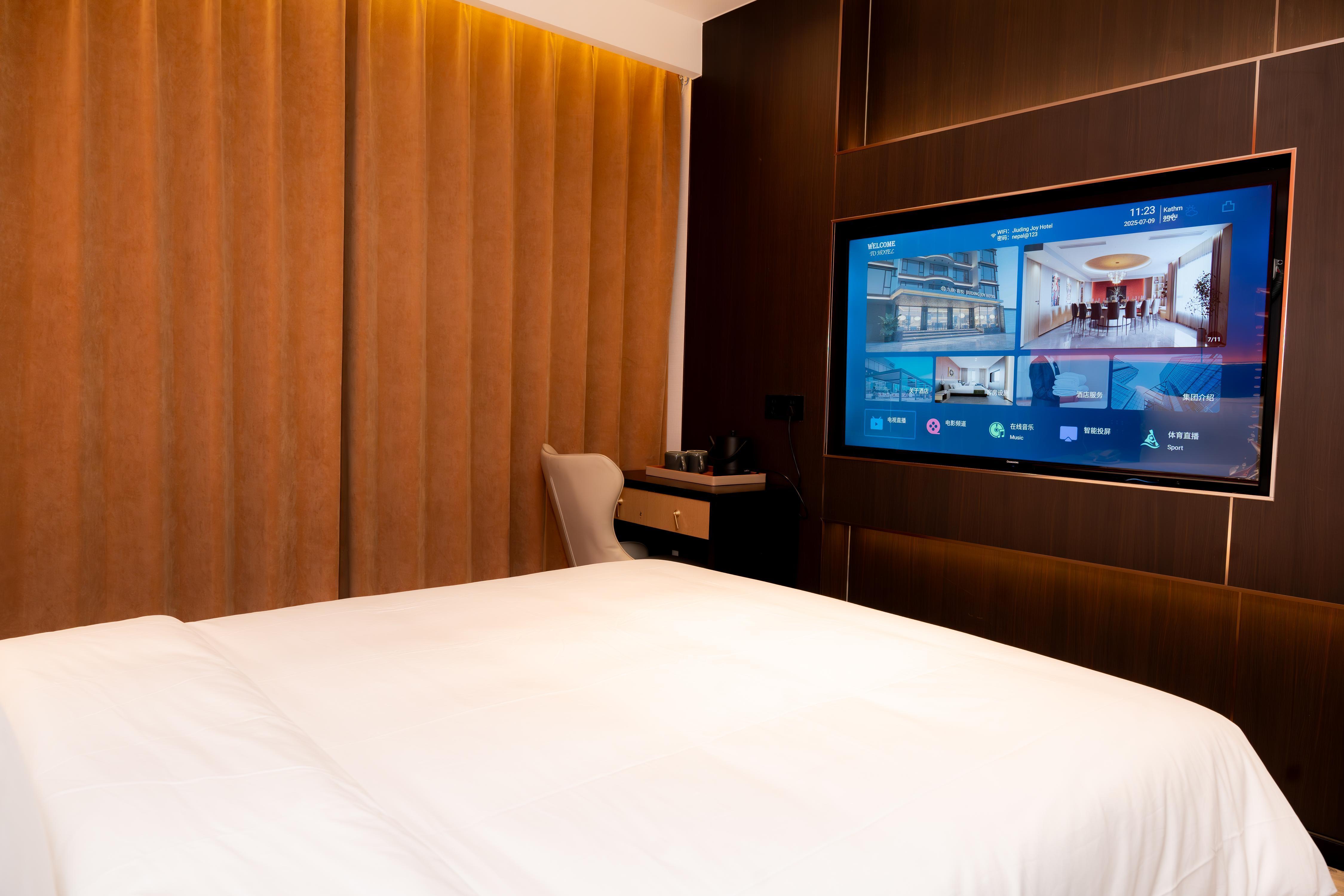 Jiuding Joy Hotel Room Type - Deluxe Double Room