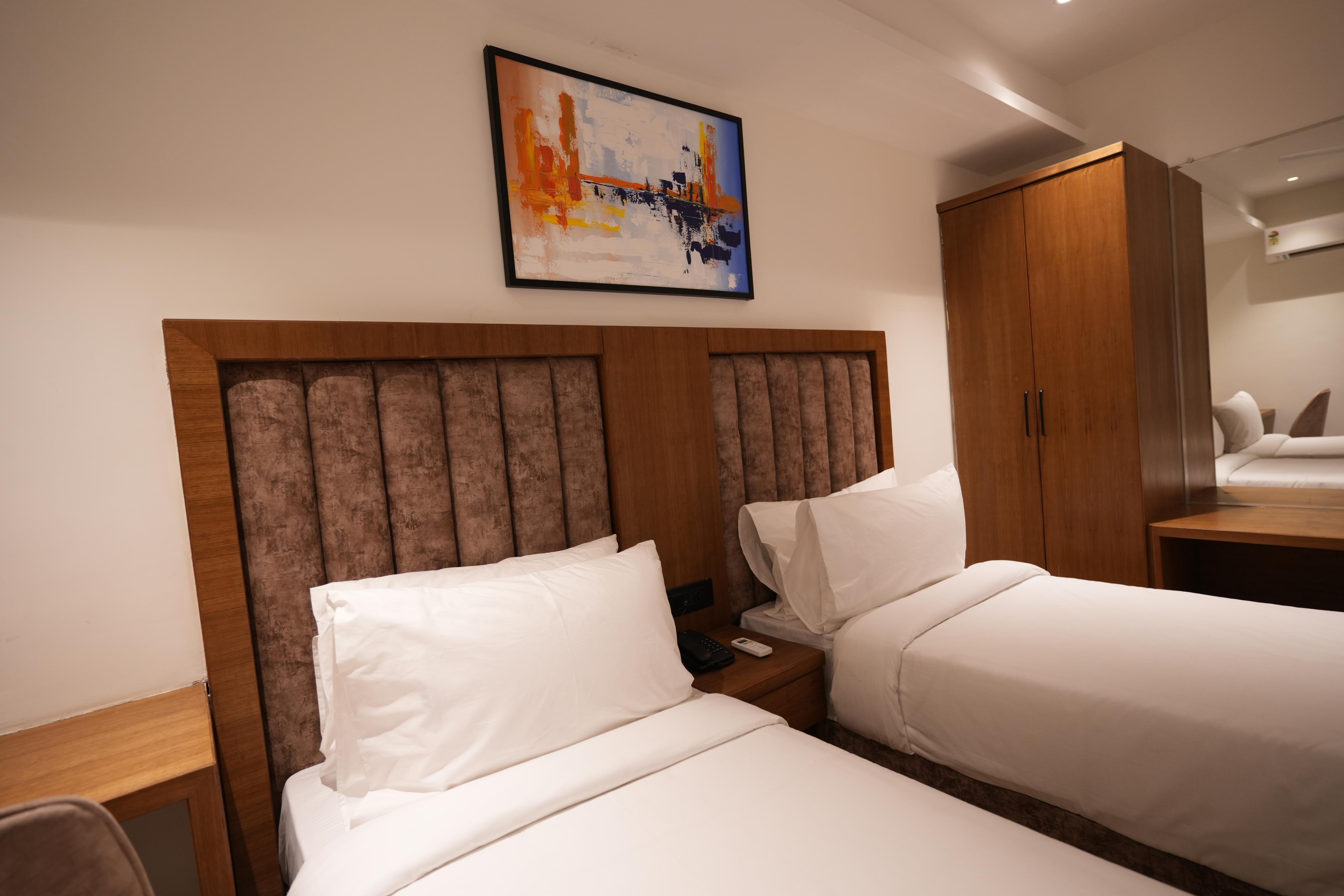 Silvotel Premier By Bizzgrow Hotels - Tap to explore photos