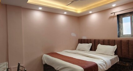 Trinetra Homestay Room Type - Deluxe Room