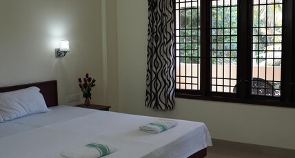 DEW DROPS APARTMENTS Room Type - Deluxe Non AC Room with Balcony