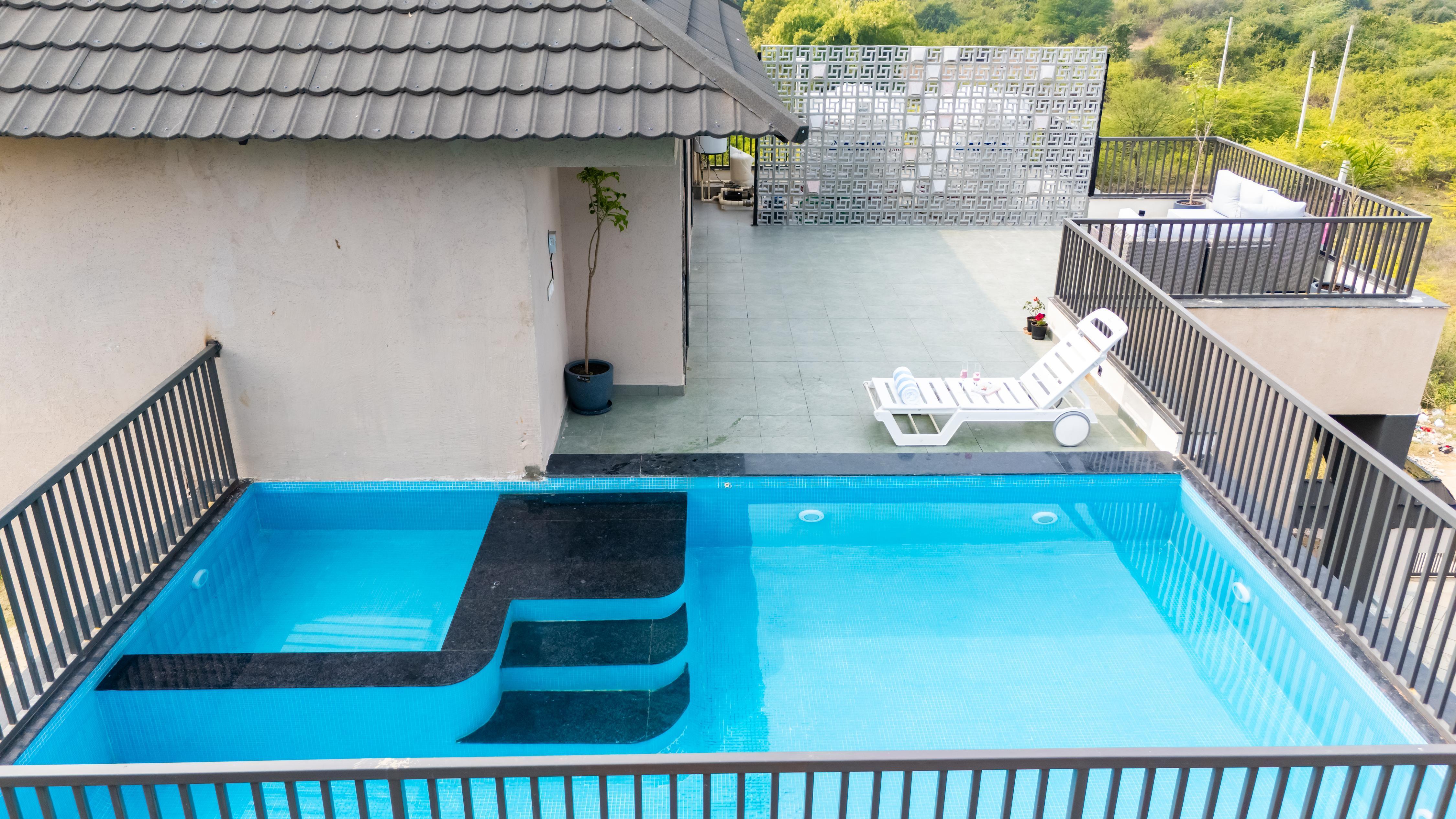 ELIVAAS Vaikunth 3BHK Villa Getaway with Rooftop Pool - Tap to explore photos