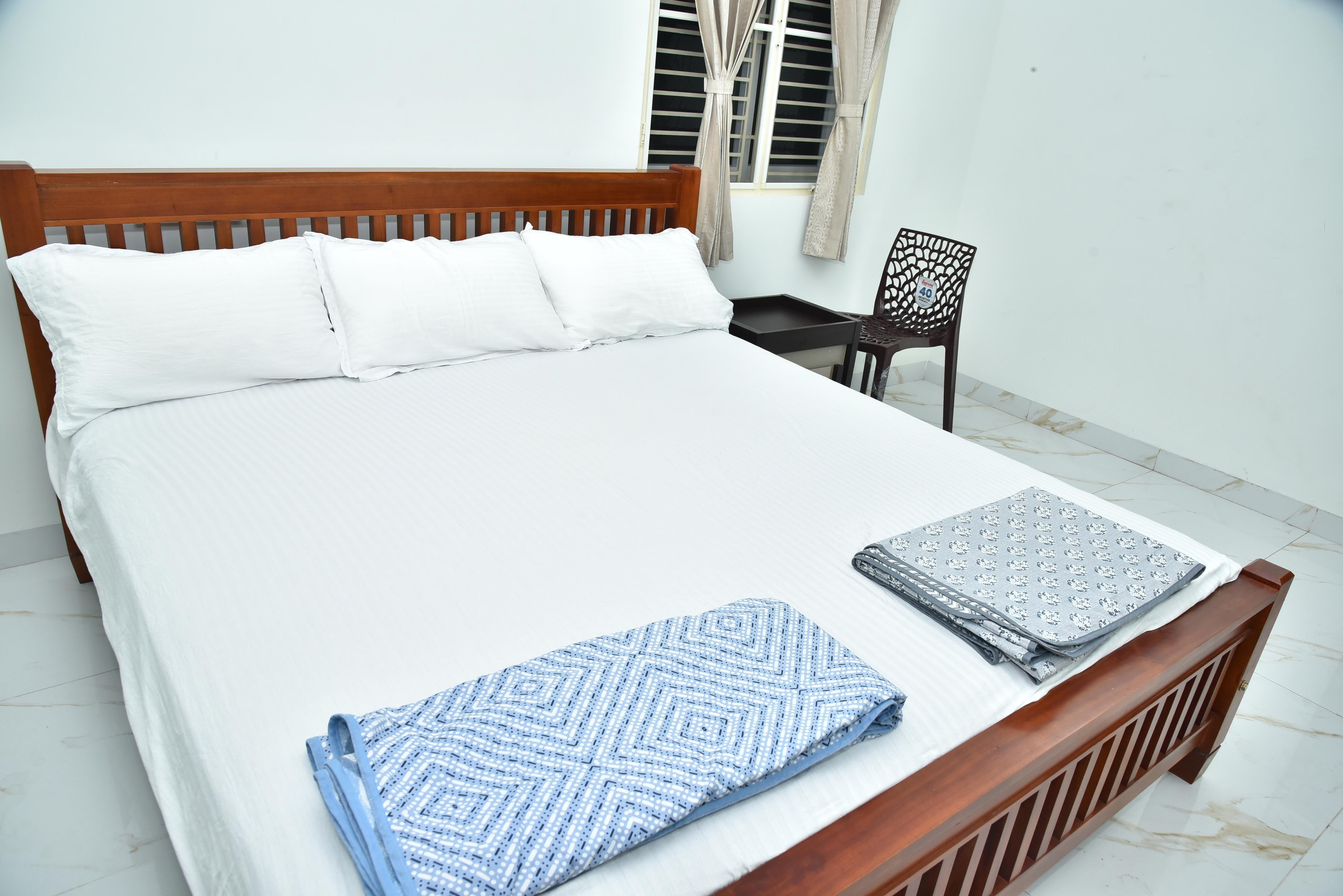 KKR RESIDENCY Room Type - Family Triple Room