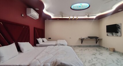 ORCHID STAYS Room Type - Family Room with AC and Wifi
