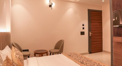 Madhuram Inn Room Type - Family Room with Balcony Madhuram Inn Room Type - Family Room with Balcony