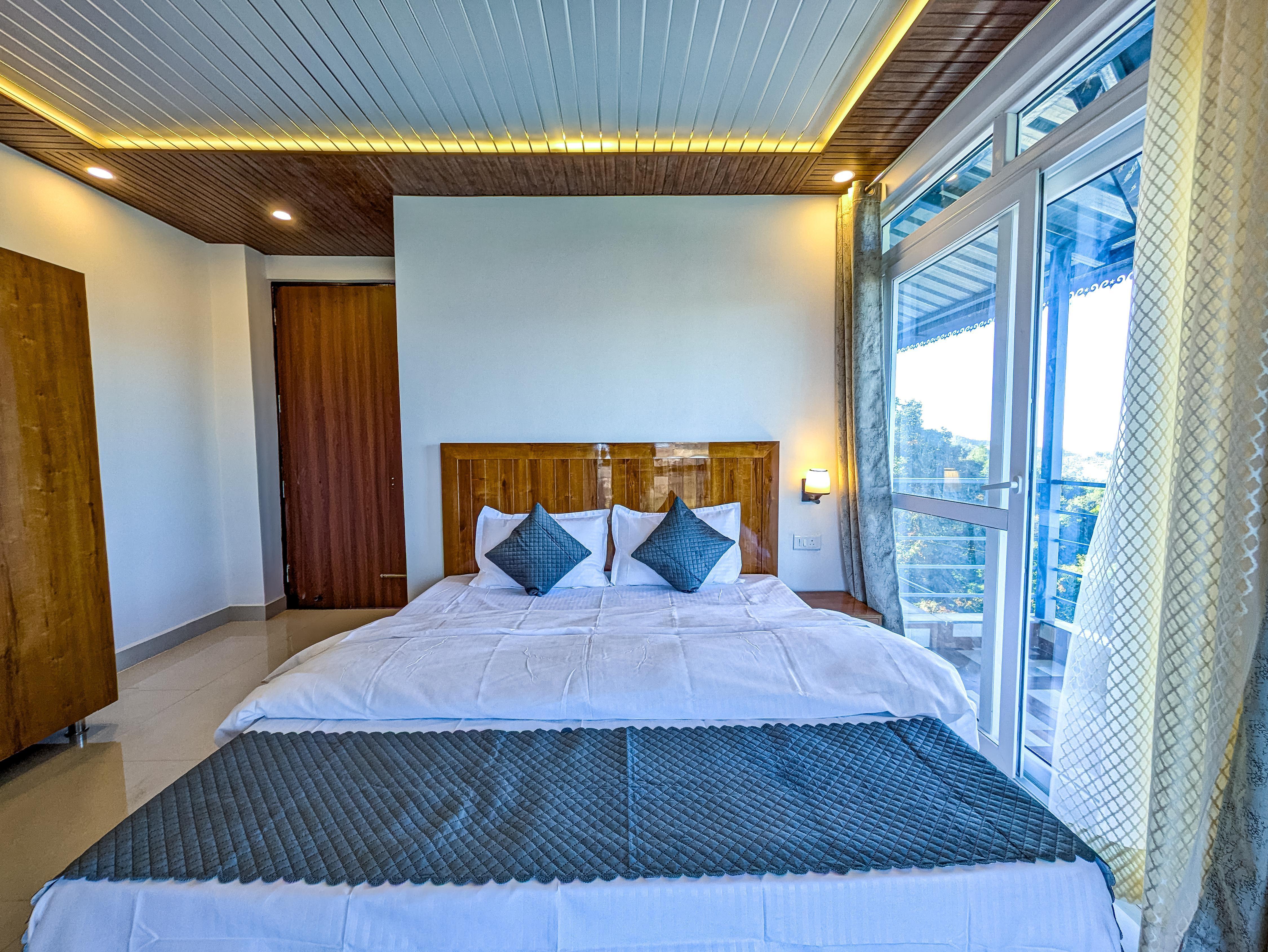 Petal Peak Retreat 2BR-FF Homestay by Homeyhuts - Tap to explore photos