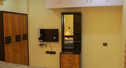 SJ HOMES Room Type - Deluxe AC Room Modern and Cozy