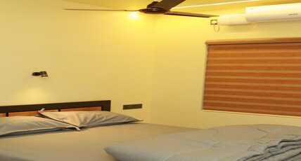 SJ HOMES Room Type - Deluxe non -ac room