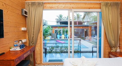 Oyster Bay Beach Resort Room Type - Wooden Cottage with Pool View