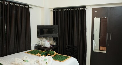 Nira Residency Room Type - Deluxe AC Room