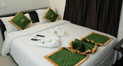Nira Residency Room Type - Standard AC Room