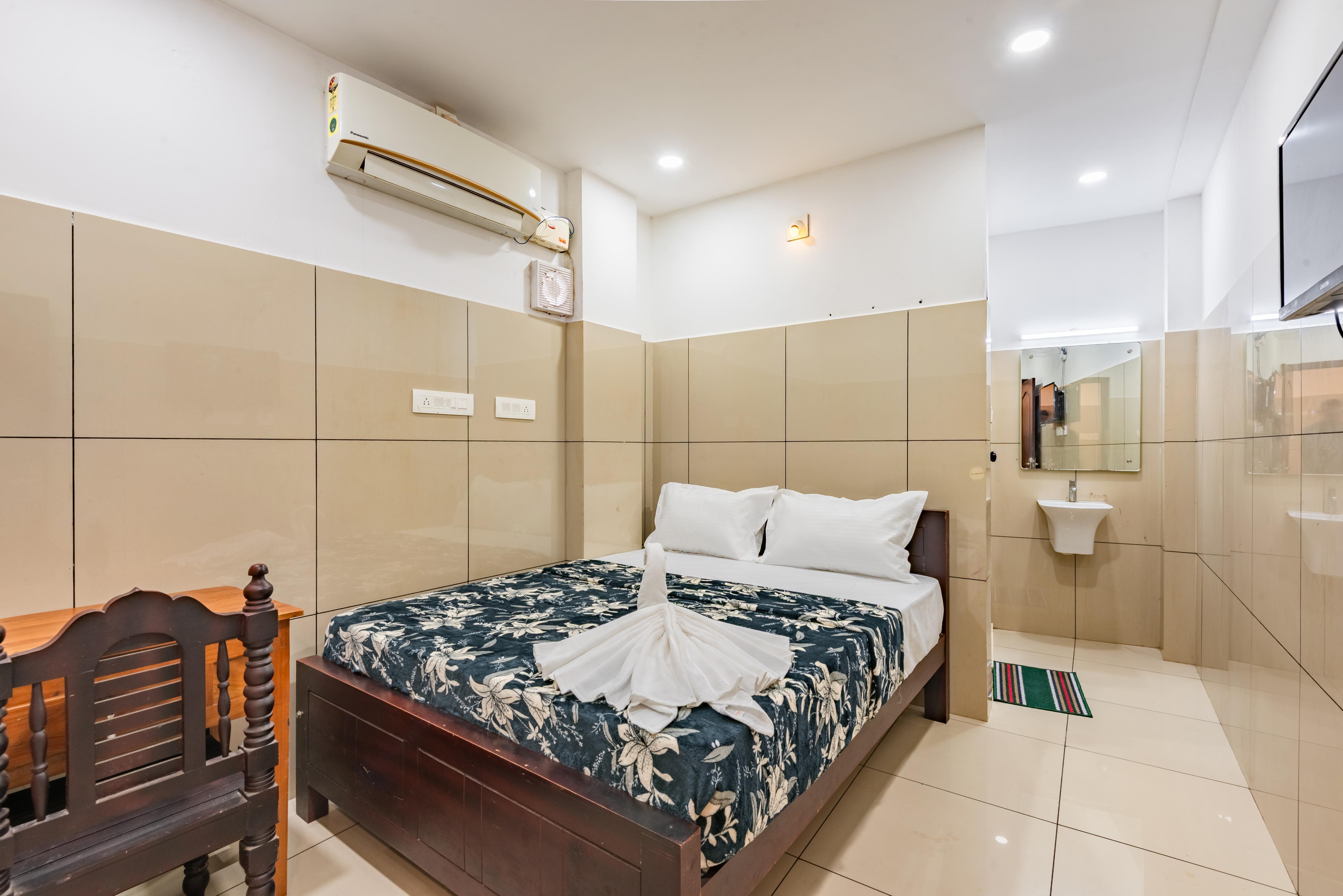 OXE RESIDENCY CALICUT Room Type - Standard Ac Room