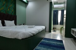 Asha Banquet And Hotels