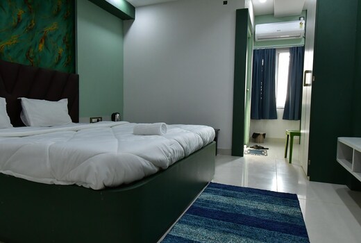 Asha Banquet And Hotels
