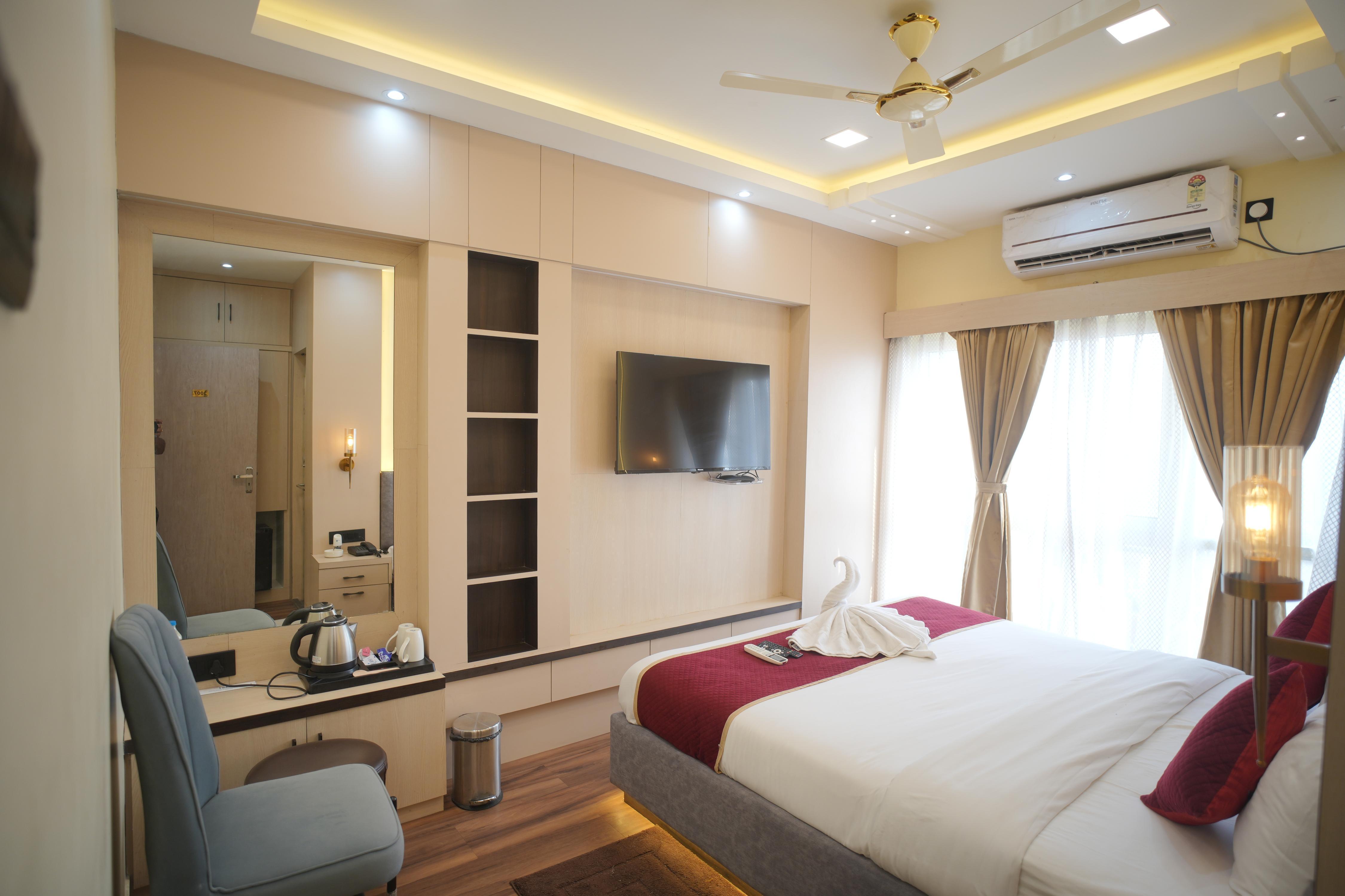 Hotel Divine International - Tap to explore photos