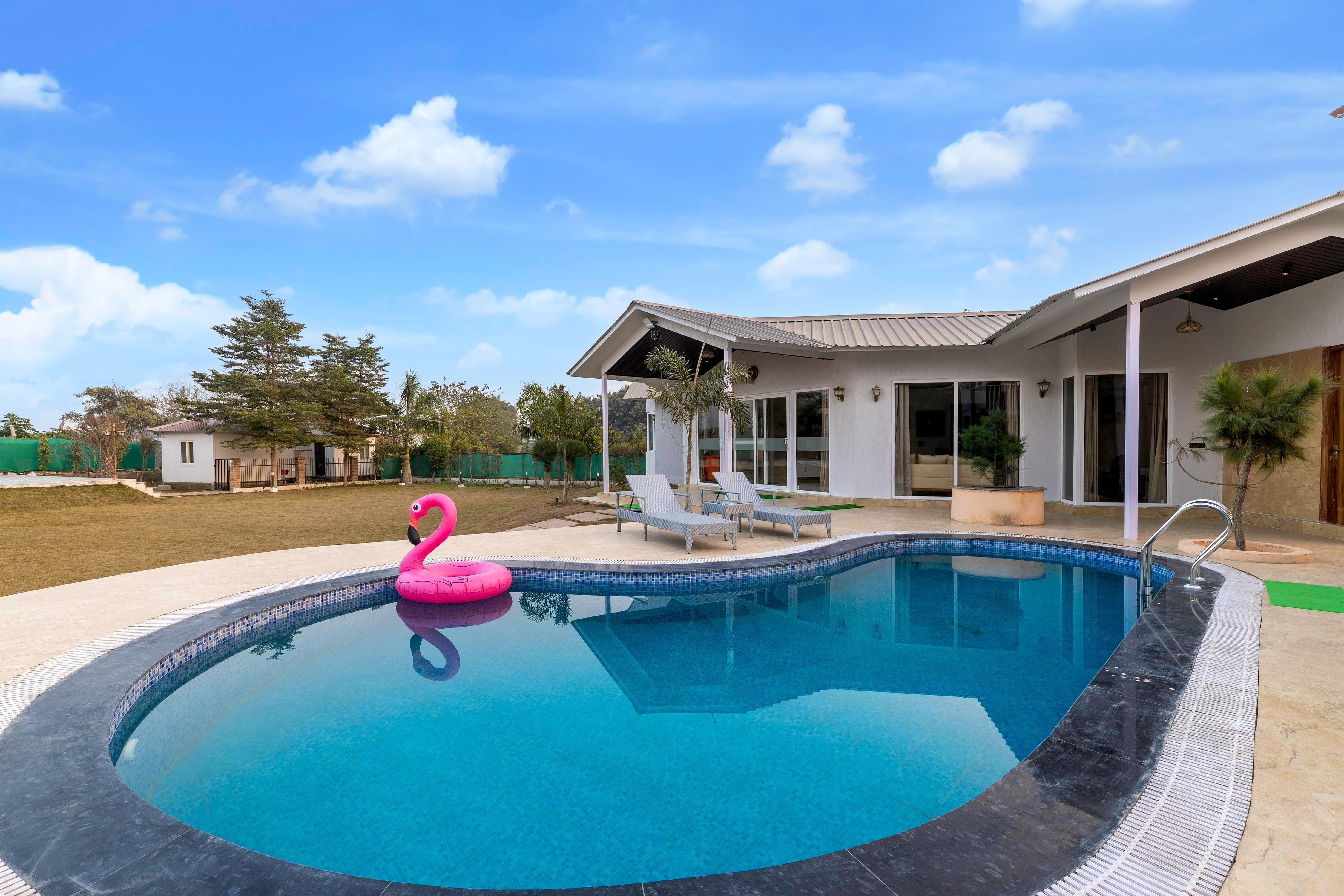 ELIVAAS Signature Vedaaz 4 BHK Farmhouse With Pvt Pool - Tap to explore photos