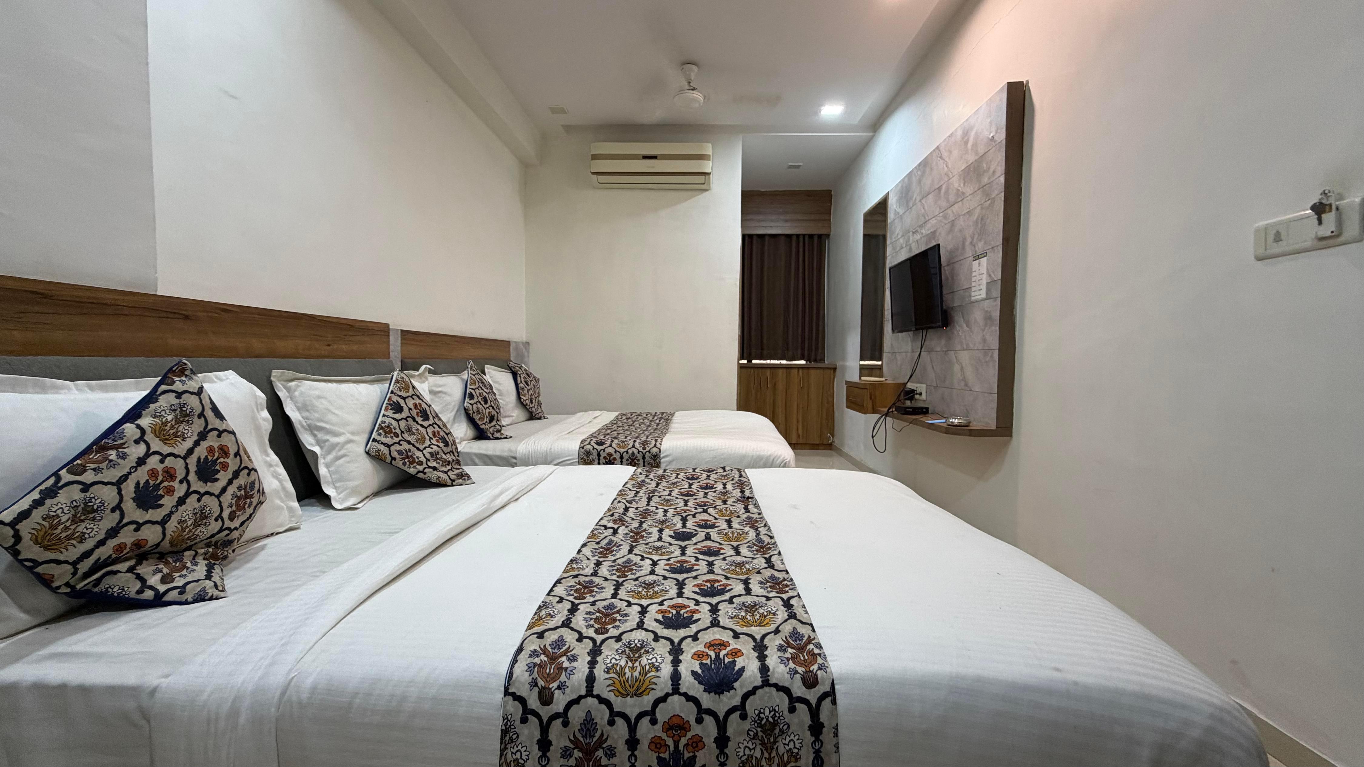 HOTEL BHAVYA, AHMEDABAD Room Type - Family Room HOTEL BHAVYA, AHMEDABAD Room Type - Family Room
