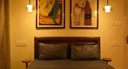 Luxury Comfortable Rooms in a 2BHK Flat at Noi Homes Room Type - Cozy Private Room in 2BHK Flat with Shared Kitchen and Balcony