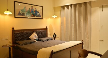 Luxury Comfortable Rooms in a 2BHK Flat at Noi Homes Room Type - Large Private Room in 2BHK Flat with Private Balcony, and Shared Kitchen and Living Area