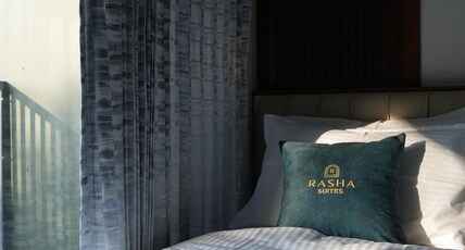 Rasha Suites Room Type - Deluxe King Room with Ac and Balcony