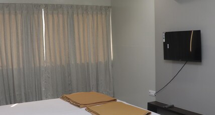 Hotel Laxmi Inn by Ambai Room Type - Deluxe AC Room