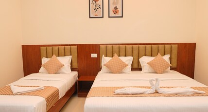 Hotel Yathra Athithya Room Type - Premium Triple AC Room