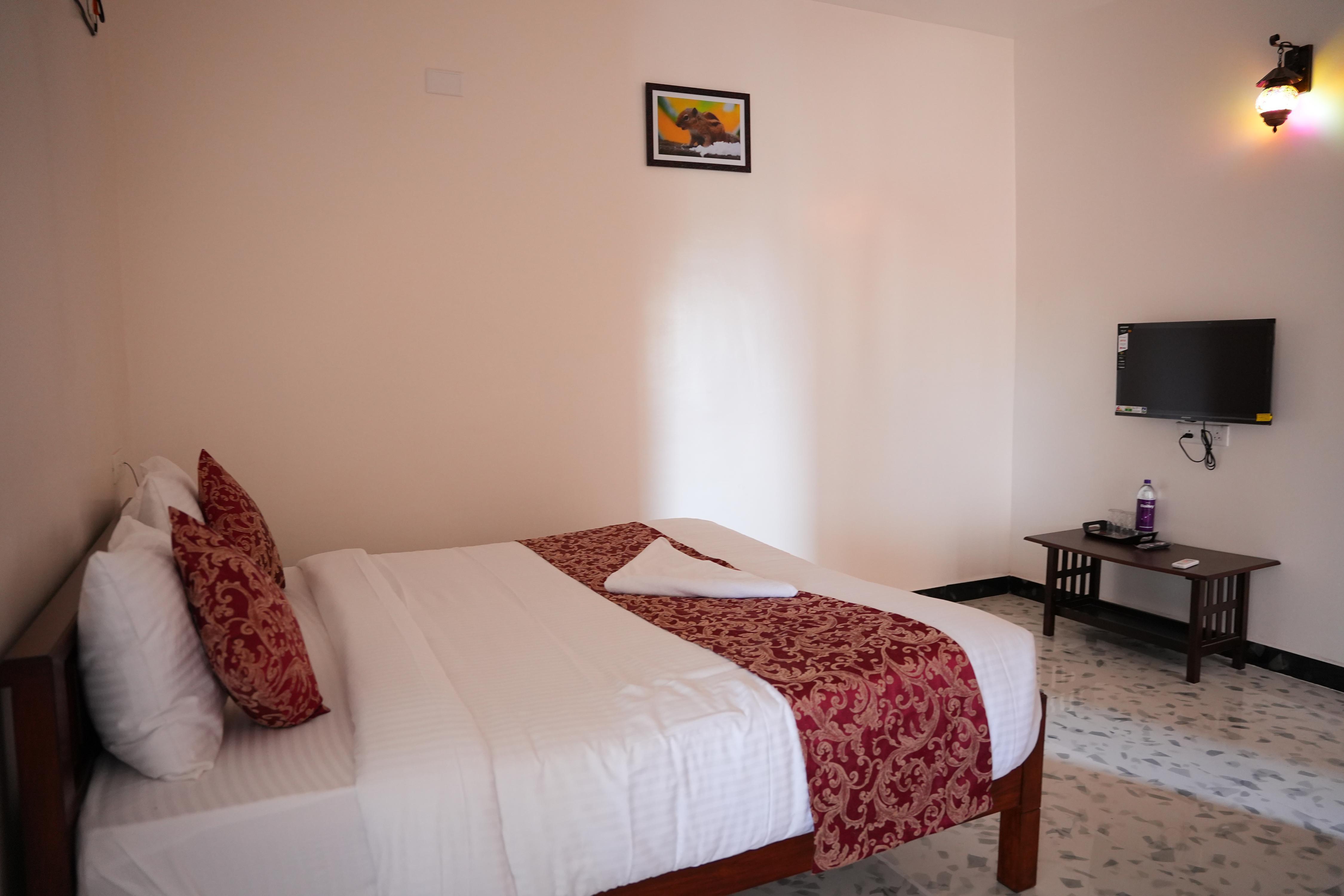 Theja Residency Room Type - Family Economy Room