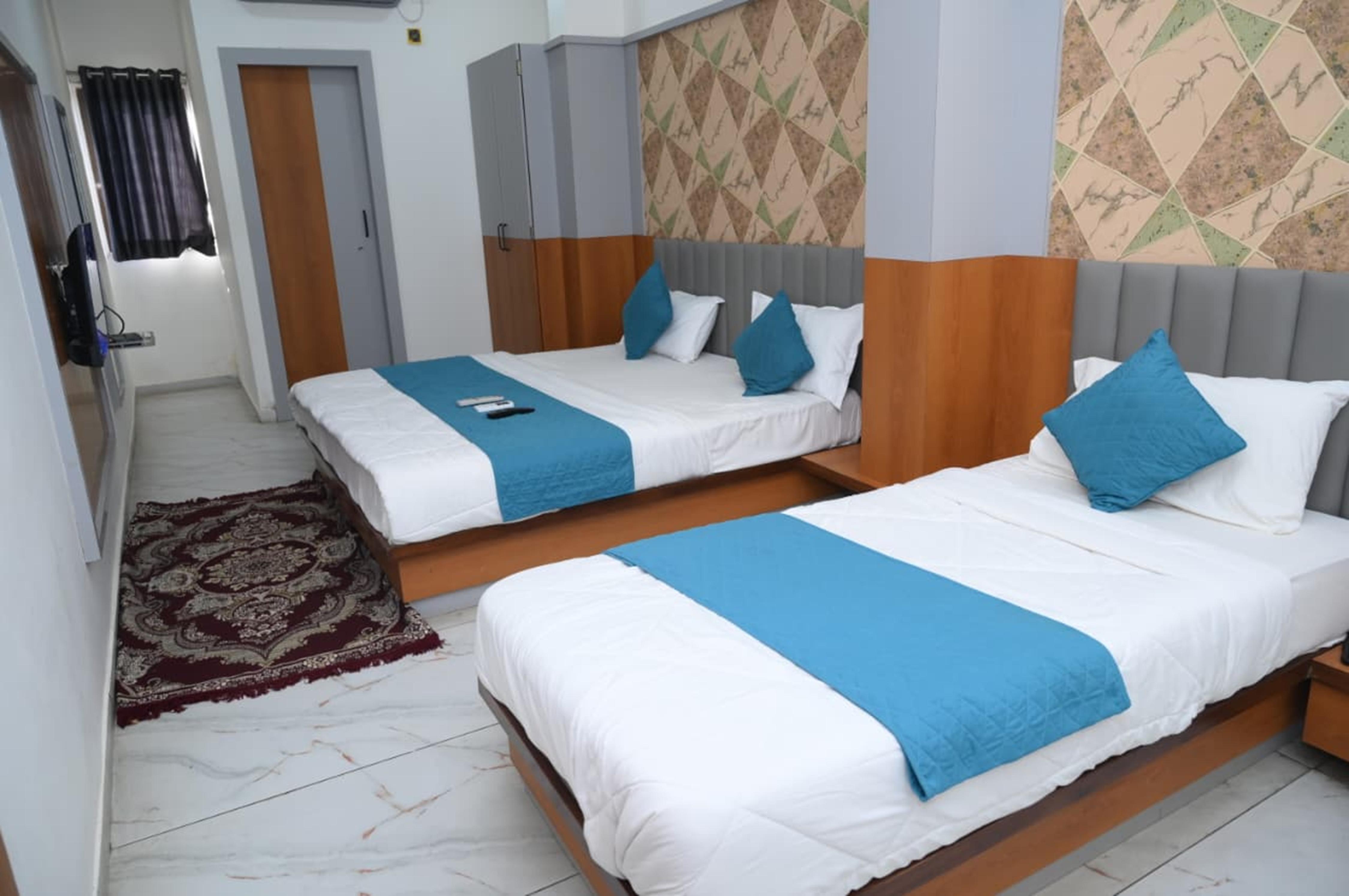 DWARKADHISH GUEST HOUSE - Tap to explore photos