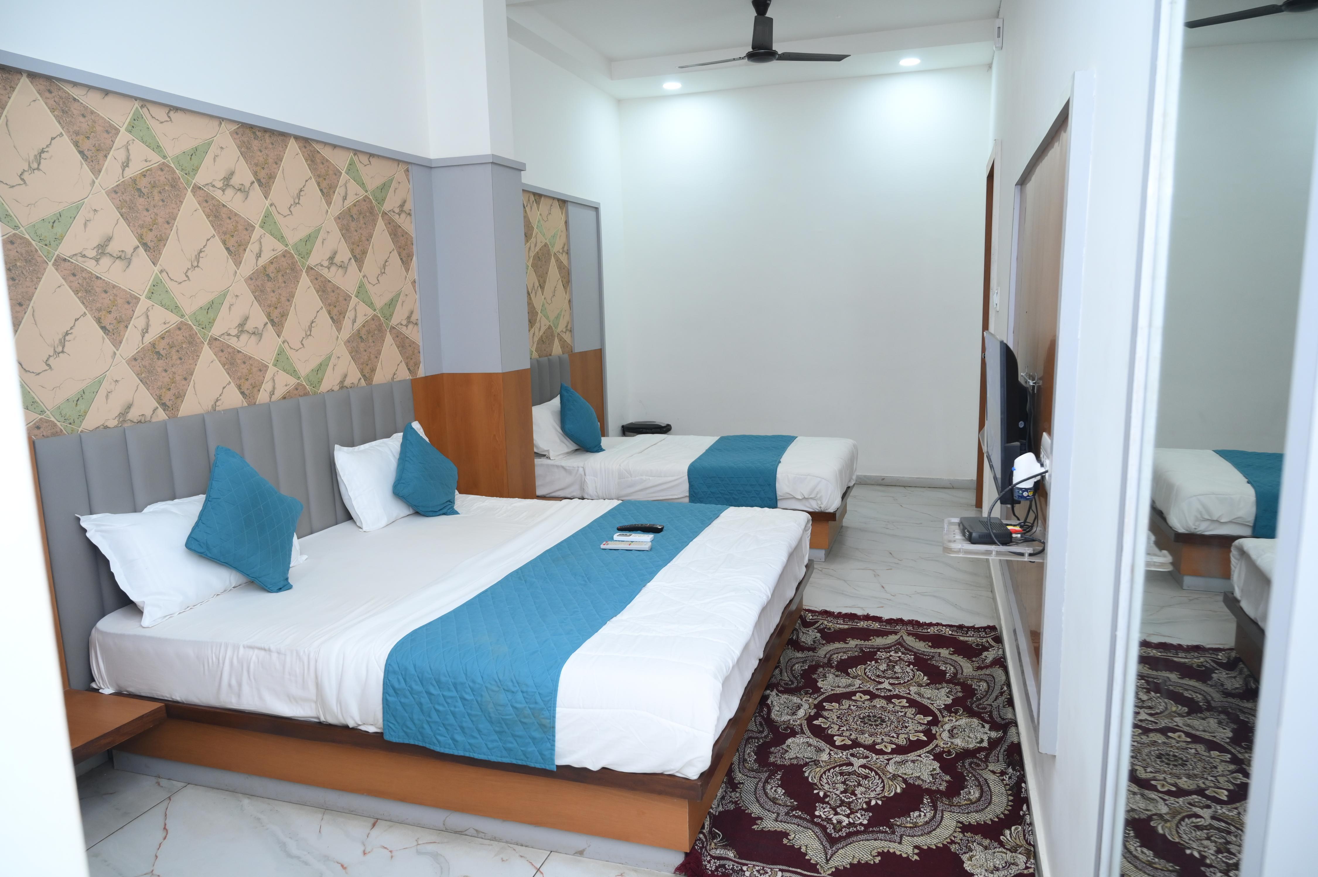 DWARKADHISH GUEST HOUSE - Tap to explore photos