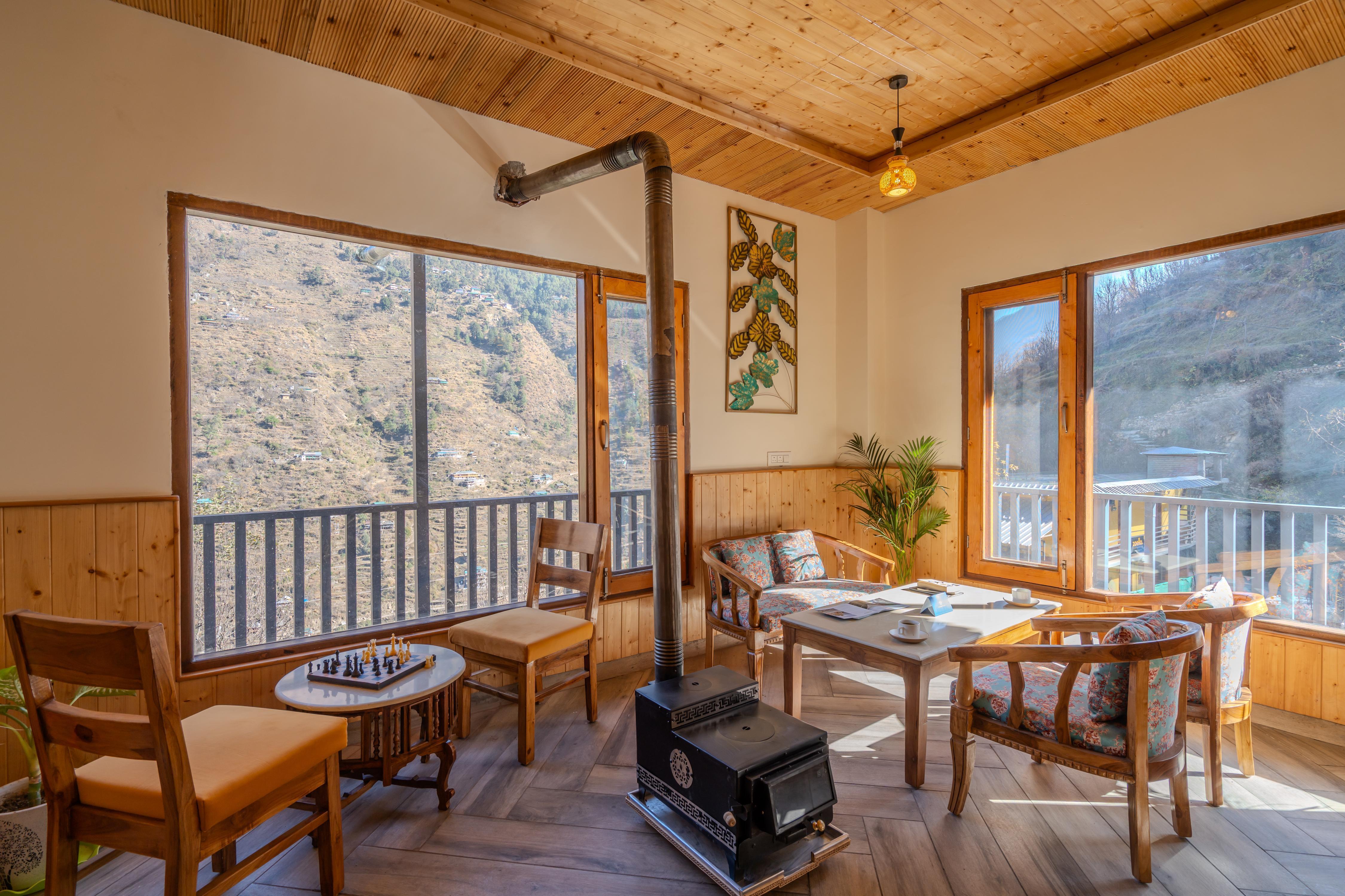 SaffronStays The Tirthan House Terrace View - Tap to explore photos
