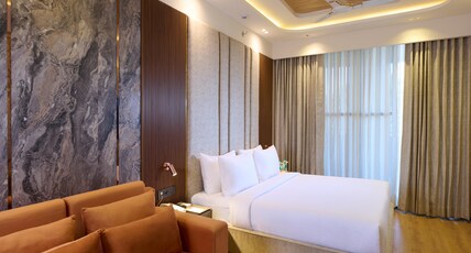 Tulip inn Gurgaon (Near Medanta Hospital) Room Type - Executive Double City View With Balcony Tulip inn Gurgaon (Near Medanta Hospital) Room Type - Executive Double City View With Balcony
