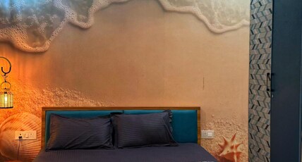 Modern Room with Mountain View in Dehradun Room Type - Beach Room