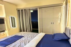 Stay Above the City Studio with Dual Balconies