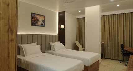 NARMADA RESIDENCY HUBLI Room Type - Deluxe Room
