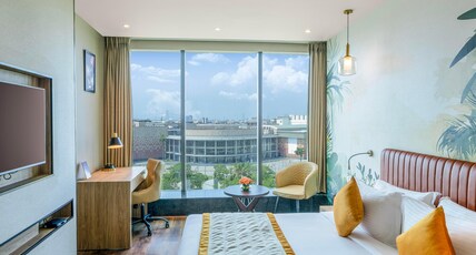 Plume Hotel - India Expo Mart Room Type - WoW Suite Guest King City View