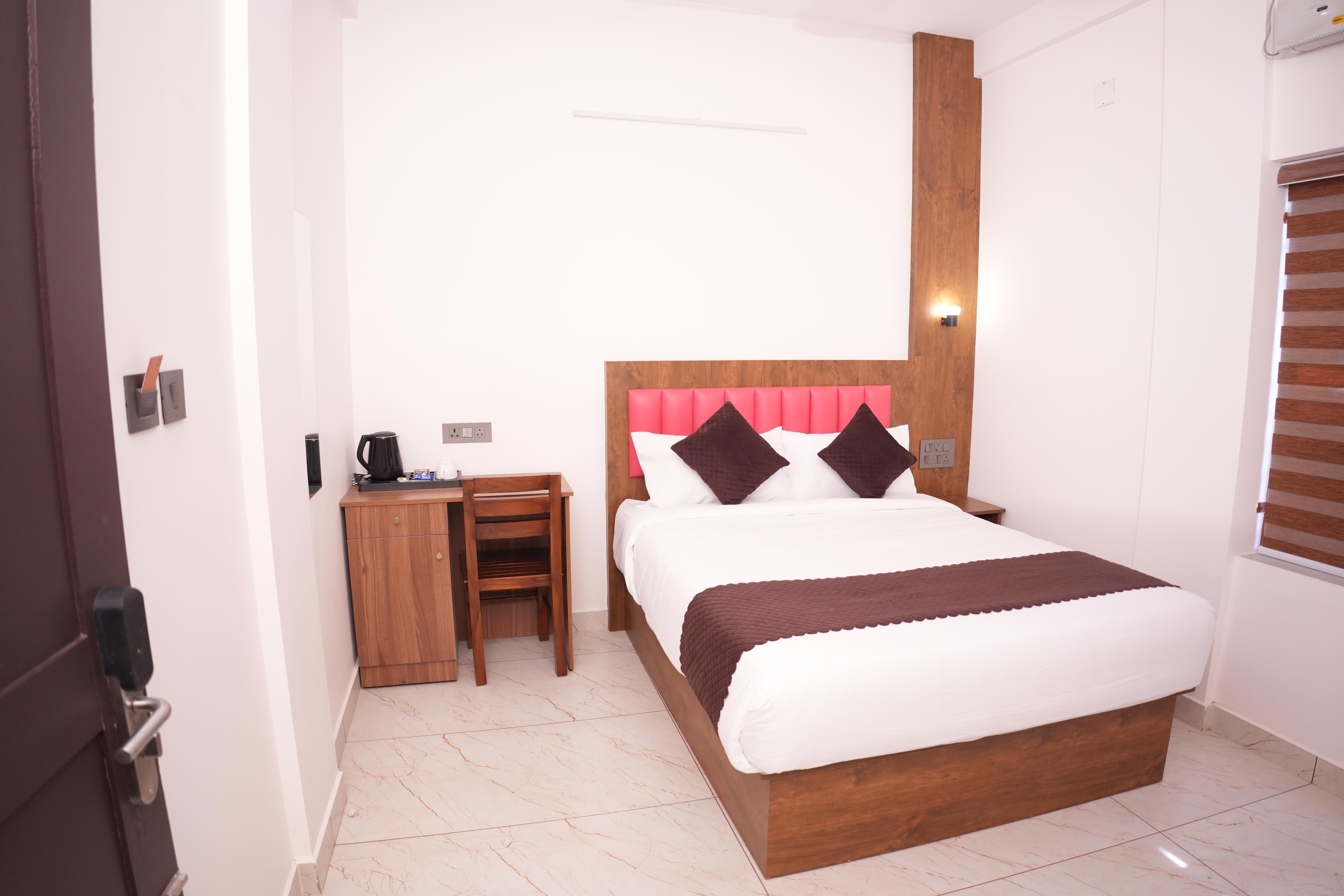 Pearl Suites Room Type - Deluxe Double AC Room