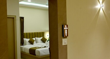 S R GRAND PREMIUM A/C ROOMS Room Type - Premium Family Suite Room