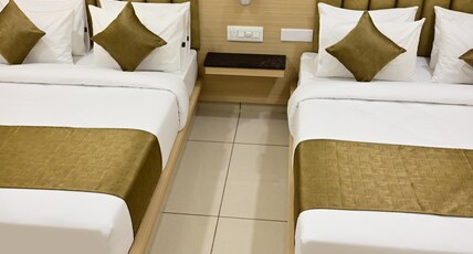 S R GRAND PREMIUM A/C ROOMS Room Type - Premium Family Standard Room