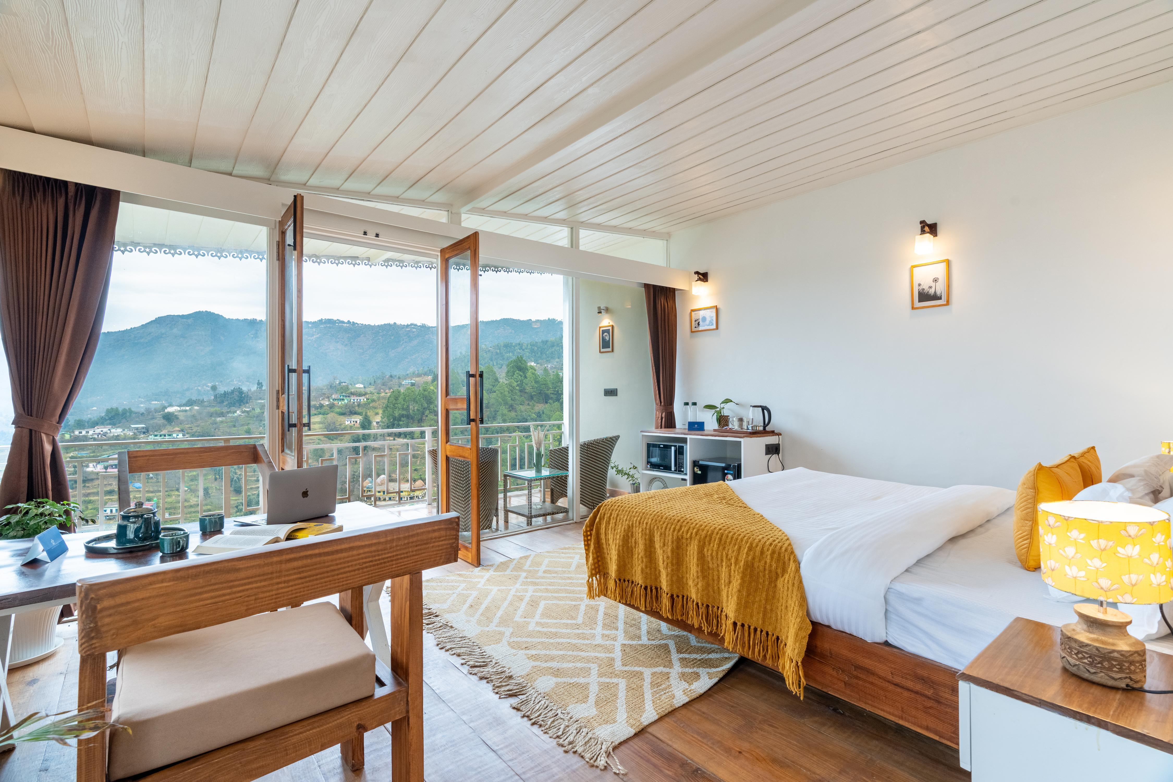 SaffronStays Prism Hill (Deluxe Room) - Tap to explore photos