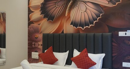 Hanee Comforts Room Type - Deluxe Room with Balcony