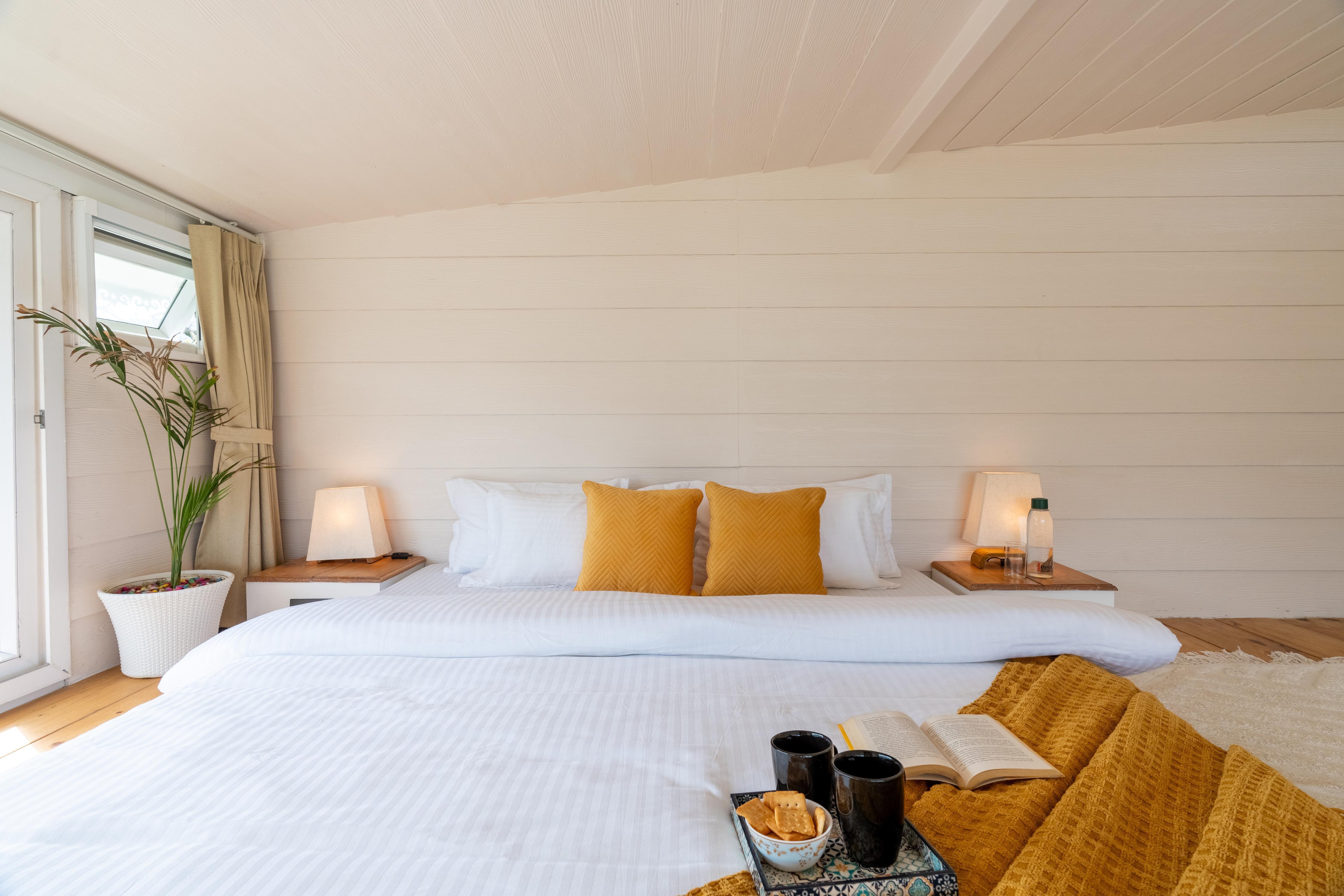SaffronStays Prism Hill (Duplex Room) - Tap to explore photos