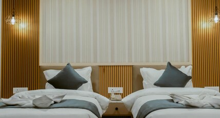 Hotel Dispur Vista is a unit of Hotel Kailash Residency Room Type - Deluxe twin bed room
