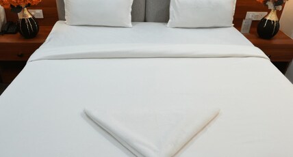 Hotel Pritika International Room Type - Deluxe Room